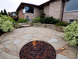 The built in seating faces the view and doubles as a retaining wall. The built in seating faces the view and doubles as a retaining wall.