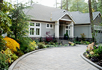 View of the new paved driveway entry design by Vanessa Gardner Nagel