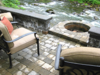 Vanessa designed this fire pit ara to have lovely evening fires next to the river
